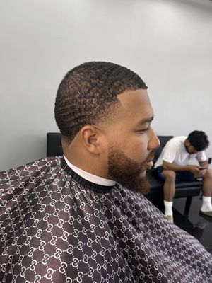 One and a half on top with the grain, high taper, beard line up