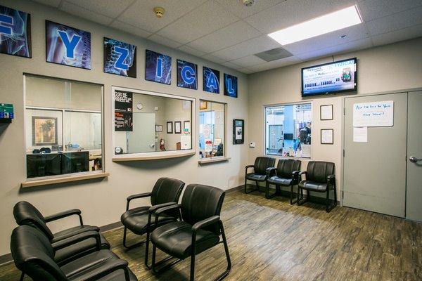 The front desk and reception area at FYZICAL - Buffalo.