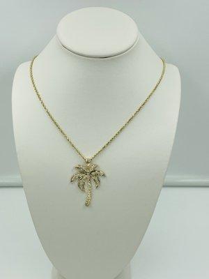 Custom Made Diamond palm tree necklace in 14k yellow gold.