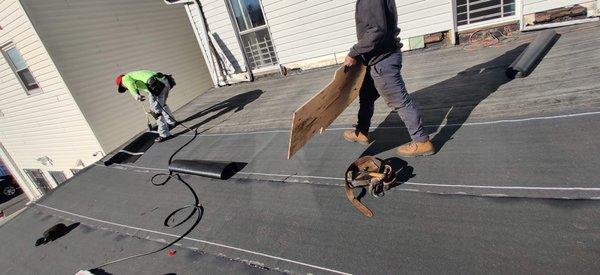 Installing cap sheets on top of underlayment. By this time, my left window is already cracked. Timestamp att 12:28 PM