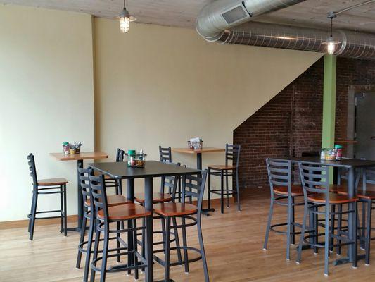 The dining room at McZ's Brew Pub has plenty of tables (high and low) for folks to relax for a nice meal or to enjoy live entertainment.