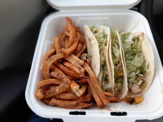 Bland cajun fries and tasteless fish taco.