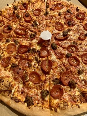 Large pepperoni, garlic, and ground beef pizza.