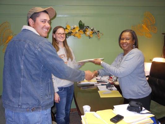 Satisfied Tax Clients picking up their Tax Refund!!