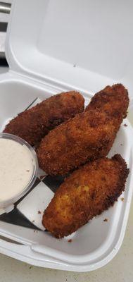 Cajun Fried Jalapeño Poppers  Jalapeño, cream cheese, pepper jack cheese, bacon, and green onions dredged in Cajun panko. Kickin Cajun Sauce