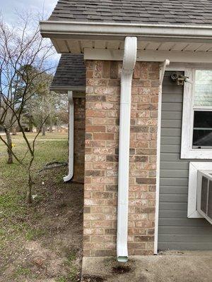 White Downspout with 3 A elbows.