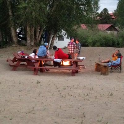 Teens sit around the campfire for this recovery retreat in Noah's Ark, Colorado