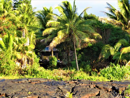 Oceanfront Bali Hut taken from the ocean and old lava fields.