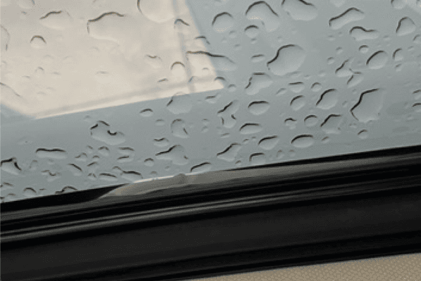 Vizion AutoSports - Bubbles in the roof tint, gaps in the edges, and loose tint hanging down.