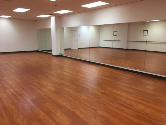 Gorgeous studio with laminate hardwoods, large mirrors and ballet bars