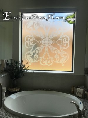 Etched glass window over a garden tub in the bathroom.  Traditional design on textured and tempered glass ...