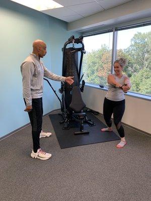 Meno-Start's Director, Fitness & Nutrition Coach Dulany Washington showing Dr. Shannon Cothran a few moves in the fitness studio.