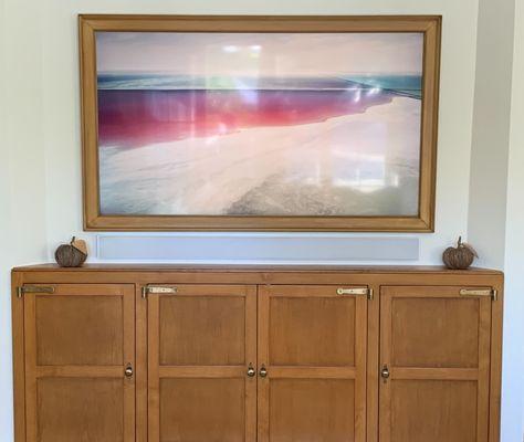 The Samsung Frame TV doesn't need to look like a modern art frame.  Custom frames and soundbars can make this fit any decor!