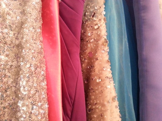 Prom dresses hanging in candy's sewing room that she altered or made from scratch!