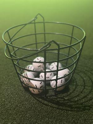 basket of golf balls