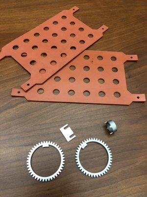 Laser Cut Neoprene Gaskets, and Aluminum Gears cut on our Fiber Laser, along with 4th Axis cut stainless steel tube.