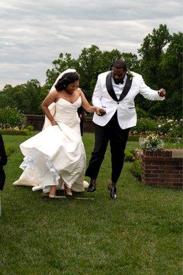 Jumping the broom during wedding ceremony