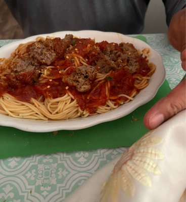 Spaghetti and meatballs, he cut them up...