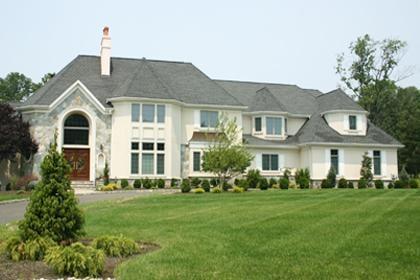 Grand Residence with Stucco and Stone Facade