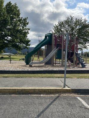 School playground between softball fields