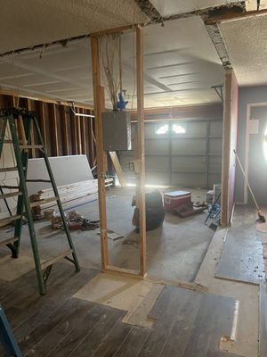 Tear down of the wall in the garage to the old kitchen