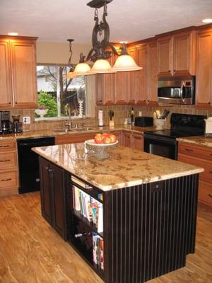 Raising the ceiling and opening up the kitchen area into the dining room created a strong statement in this home.