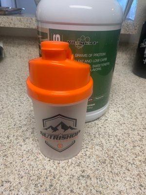 Protein powder and NUTRISHOP shaker cup