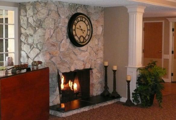 Cozy fireplace offers a homey atmosphere for their residents.