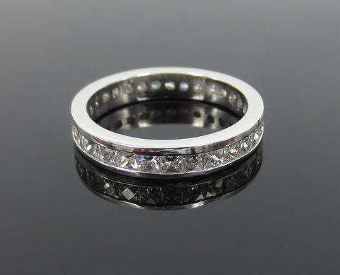 French cut diamond & platinum eternity band set with special cut D/E color, VVS clarity diamonds.