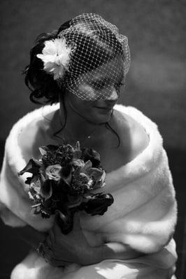 lena wore a custom feather floral fascinator with wraparound french net birdcage. photo: greer manolis, bell photography