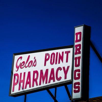 The sign on top of Gelo's Point Pharmacy! Photo credit to @shanestroud for this amazing picture!