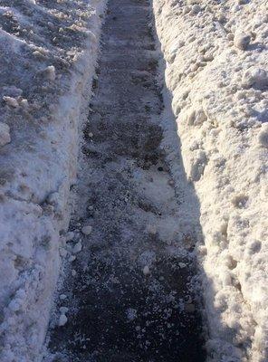 Emergency trails cut down S. Centerville road after sidewalks became buried in thick snow and ice from interstate plow trucks.