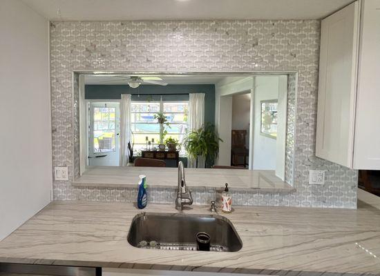 Back splash with glass tile.