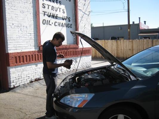 Junior the shop mechanic working hard