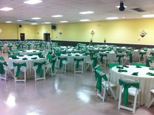 Tables arranged for St. Patrick's Day banquet.