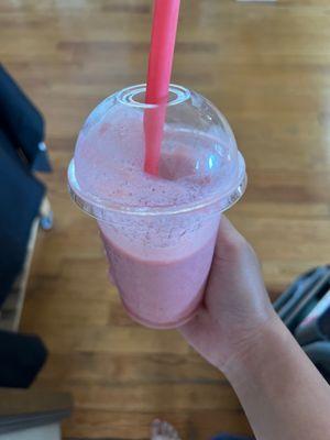 Banana smoothie with strawberry flavored syrup