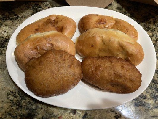 A sampling of baked mushroom, baked cabbage and fried beef piroshki. YUMMY!!!