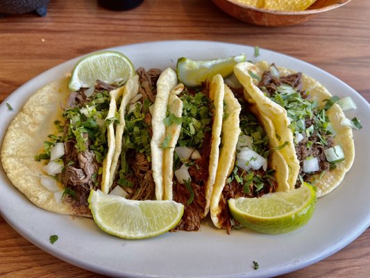 2 desabrada(shredded beef), 2 al pastor(marinated shredded pork), 1 barbacoa(marinated beef cheeks). Taco Tuesday $2.25 ea.