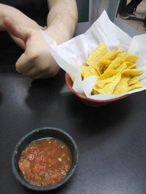 They offer chips and a medium spicy salsa while you wait for your food.