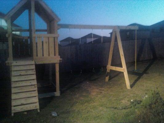 Swing set built new in your yard. All treated wood used.