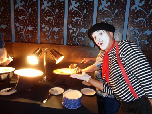 A Mime Lurking at the Pizza Table