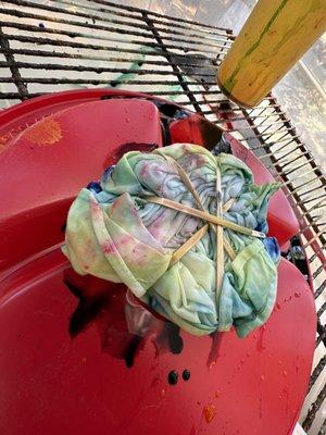 Working on my tie-dye shirt with some expert instruction for patterns and colors.