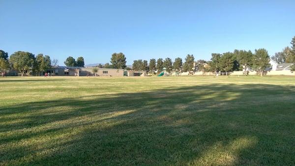 Soccer field and playset in the distance.