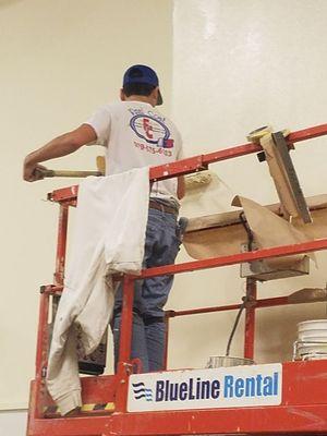 Texas A&M air hangar painting interior walls