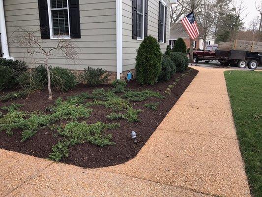 Hand spread mulch job