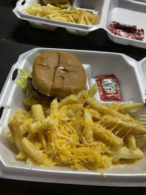 Cheeseburger and cheese fries meal