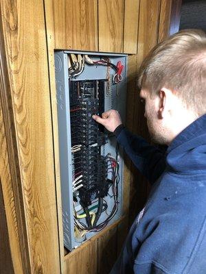 Finishing up a clean, professional panel replacement!