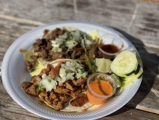 Spicy pork taco and steak taco. Green salsa is legit. Best street tacos in PC