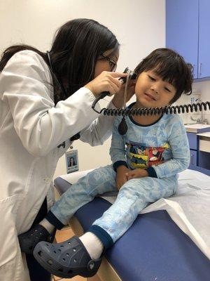 Dr. Liu taking care of our son Zen Jun when he got sick. Thank you Doctor.