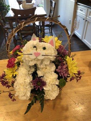 I received this beautiful arrangement in memory of my beloved cat who died last week.  So sweet